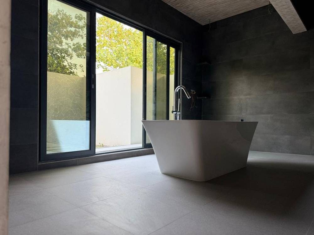 Villa bathroom with free-standing tub